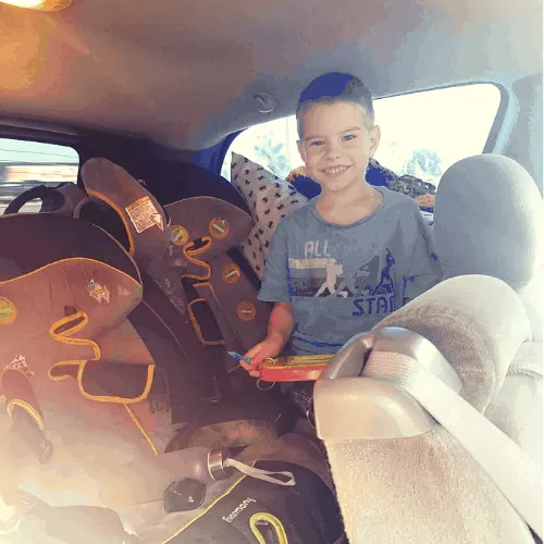 Road Trip Hacks For Kids | Top 10 Tips 42 boy on road trip with magnadoodle
