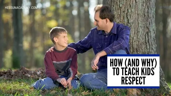 Dad teaching his son about respect while sitting under a tree
