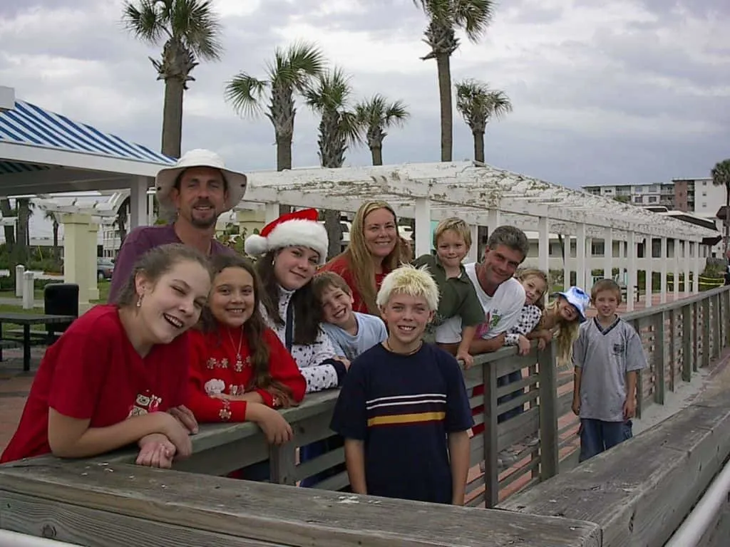 A Christ-Centered Christmas Eve Tradition: The Traveling Dinner 3 Homeschooling family on the beach enjoying a Christ-centered Christmas Eve tradition of a traveling dinner.