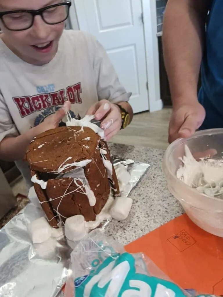 Gingerbread Nativity Instructions | Simple STEM Activity 10 Octagon Gingerbread Nativity shape using melted marshmallows as glue