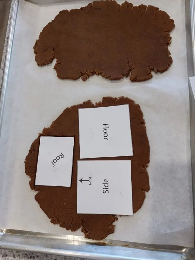 Gingerbread Nativity Instructions | Simple STEM Activity 9 cutting out gingerbread house structure with paper templates