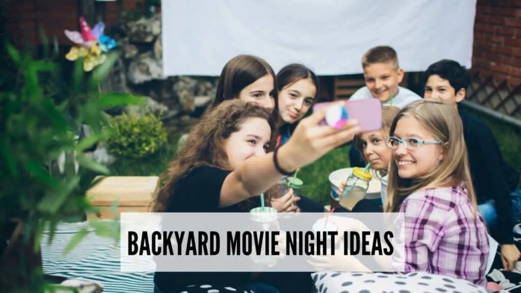 Backyard Movie Night Ideas 1 group of kids enjoying a backyard movie night