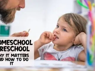 homeschool preschool little girl and her dad doing some learning