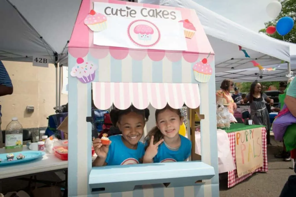 Support Your Child Entrepreneur with the Acton Children's Business Fair 2 two child entrepreneurs in their cupcake stand at an Acton Children's Business Fair
