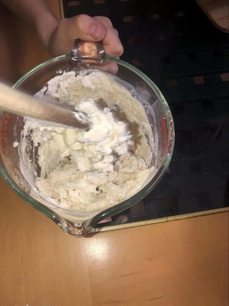Paper Mache Dragon STEM and Craft Project Tutorial 10 mixing flour and water for paper mache dragon