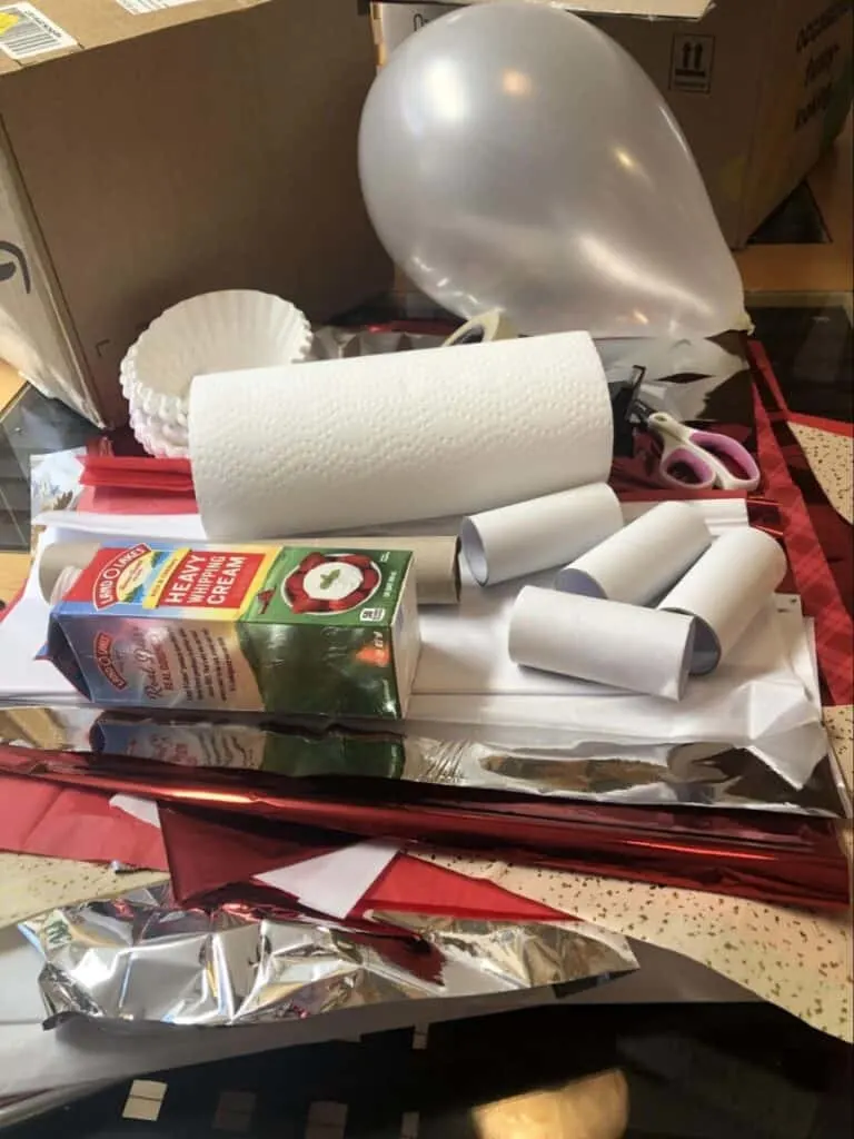 Paper Mache Dragon STEM and Craft Project Tutorial 3 balloon, paper towels, coffee filters, and other materials need for a paper mache dragon