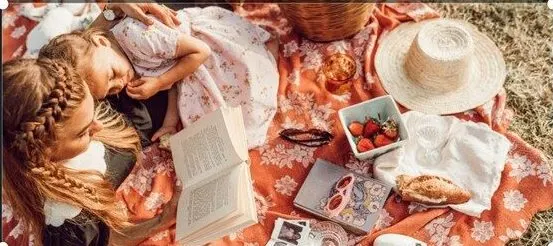 A Free Homeschooling Style Quiz What's Your Homeschooling Style? 1 mom and child reading books as the cover of a homeschooling style quiz
