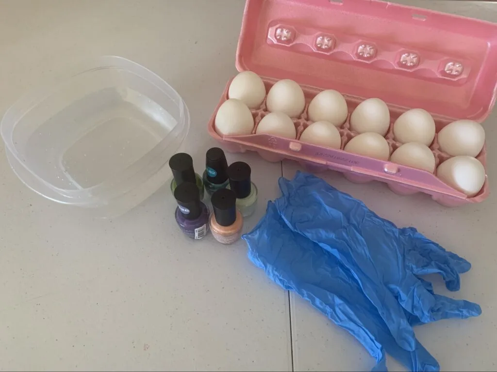 Marbled Eggs - A STEM Lesson on Density For Kids 1 eggs, water, gloves, and nail polish needed to make marbled eggs