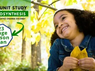black girl smiling and holding a yellow leaf while getting ready for her free photosynthesis lesson plan and unit study